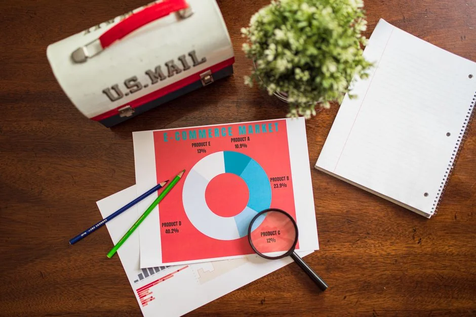 Close-up of various marketing documents on a desk, perfect for business and strategy discussions.
